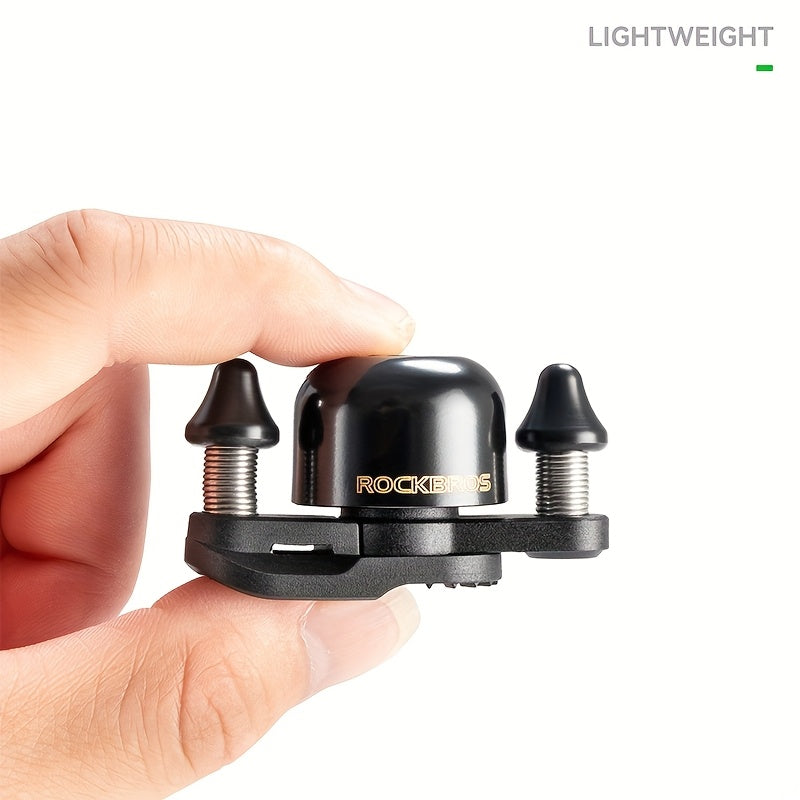 ROCKBROS Mini Cycling Road Bike Bell - Dual Bell Hammers Design, Black Copper Finish, Ergonomic Handlebar Mount for Enhanced Safety & Control, Cycling Accessories, Bike Handlebar Accessory, Sleek Metallic Bell, Durable Construction